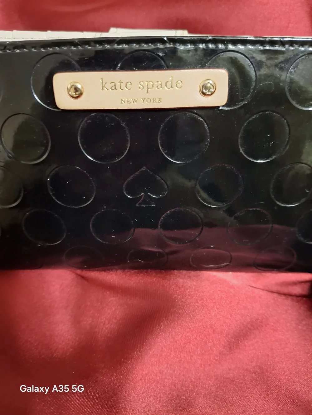 kate spade Black Patent Leather Dot Embossed Continental Slim Wallet